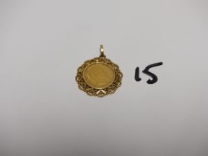 1 pendentif monture ouvragée en or sertie d'une pièce de 10Frs. PB 5,1g