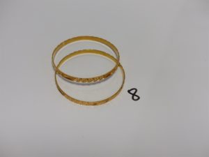 2 Bracelets en or 21K rigides et ouvragés (Diamètre 6cm). PB 30,3g