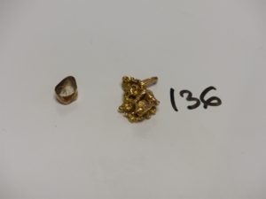 1 Moulure de dent en or et 1 pendentif pepite en or. PB 15,7g