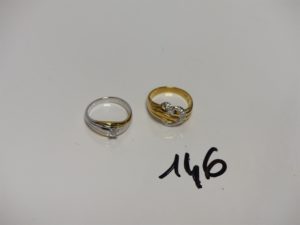 2 Bagues en or (1 bicolore réhaussé d'un diamant, Td52)(1 à décor d'un coeur orné de petits diamants, Td52). PB 9,4g