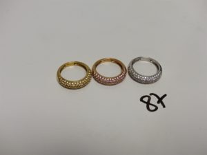 3 bagues en or ornées de pierres (1 en or jaune Td53)(1 en or rose, 3 chatons vides, Td54)(1 en or gris,Td54). PB 13g