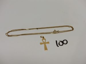 1 chaîne maille gourmette en or (L50cm) et 1 croix de vie en or. PB 3,6g