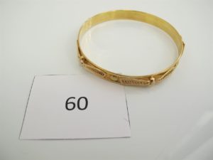 1 Bracelet rigide en or à décor filigrané(D7cm).PB 13,3g.