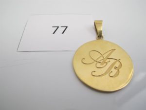 1 Médaille en or gravée"AB".PB 23,3g.