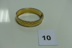 1 bracelet rigide articulé ouvrant ouvragé en or (diamètre 5,5/6cm). PB 24,9g