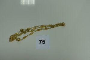 1 collier en or à motif filigrané (L80cm). PB 19,8g