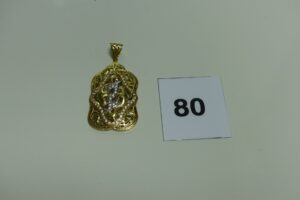 1 pendentif bicolore et ouvragé en or orné de petites pierres (H5,5cm). PB 7,5g