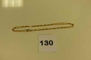 1 chaîne maille alternée en or (L60cm). PB 5g