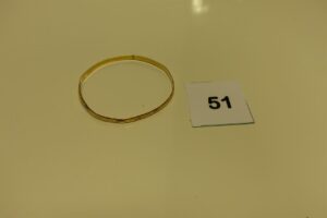 1 bracelet rigide ouvragé en or (diamètre 7cm)(à redresser tordu). PB 10,6g