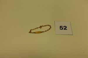 1 Bracelet gourmette gravée en or (fermoir et anneau de bout cassés). PB 3,5g