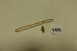 1 chaîne maille gourmette en or (L54cm) et un pendentif en or à décor de la carte Corse. PB 8.9g