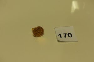 1 bague en or sertie d'une pièce de 20frs RF (Td57). PB 11.1g