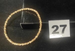 1 Bracelet en or torsadé taille enfant (Diam 5cm, tordu). PB 7,9g