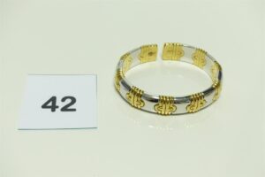 1 bracelet gourmette en or bicolore ouverte (diamètre 6cm). PB 56g