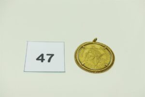 1 pendentif en or serti-griffes 1 pièce Cacique de Venezuela. PB 26,7g