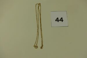 1 chaîne maille forçat en or motif central orné d'un diamant environ 0,10ct (L50cm). PB 4,1g