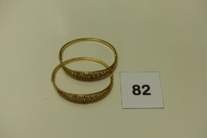 2 bracelets en or rigides articulés ouvrant motif central orné de pierres 'diamètre 5,5/6cm, 1 peu cabossé). PB 19,9g