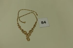 1 collier en or motif central orné de pierres (L32cm). PB 15g