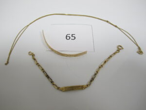 1 Bracelet en or d'identité gravé "Anne Laure"(L15cm),1 chaine en or(L46cm),1 bris d'or.PB 9,24g.