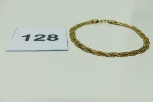 1 Bracelet en or maille tréssée (abimé, L18cm). PB 9,4g