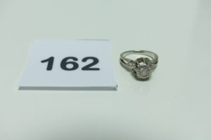1 Bague en or et platine réhaussée d'un petit diamant taille rose (Td 49). PB 3,9g
