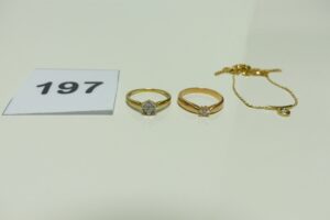 1 collier en or motif central orné d'un petit diamant (L38cm) et 2 bagues en or (1 rehaussée d'un petit diamant Td52)(1 ornée de petits diamants Td52). PB 6,9g