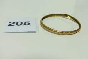 1 bracelet pour enfant en or (très abîmé, diamètre 5,5cm). PB 6,7g