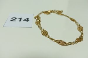 1 collier en or à motifs filigranés (cassé). PB 7,1g