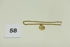 1 Pendentif en or 750/1000 signe astrologique balance et 1 bracelet en or 750/1000 maille corde (L22cm). PB 4,5g