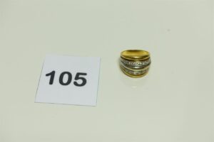 1 Bague en or 750/1000 bicolore ornée de 2 rangs de petites pierres (Td57). PB 9g