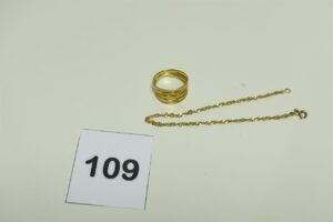1 Bague ouvragée en or 750/1000 (Td56) et 1 bracelet maille torsadée en or 750/1000 (L 19cm). PB 3,9g