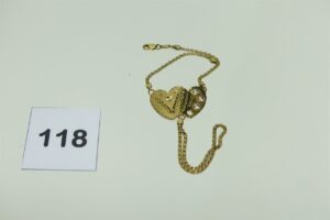 1 Bracelet de doigt en or 750/1000 motif central à décor de coeurs dont 1 orné de 3 pierres (1 chaton vide, L 18cm). PB 8,6g