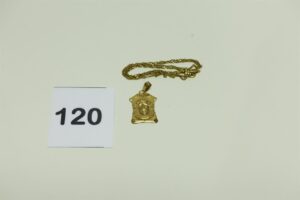 1 Chaîne cassée en or 750/1000 et 1 pendentif à décor du Christ en or 750/1000. PB 5,2g