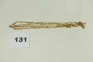1 Collier sautoir à maillons filigranés (L 78cm) en or 750/1000. PB 16,1g