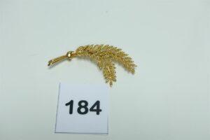 1 Broche à décor floral en or 750/1000 (L7cm). PB 16,3g