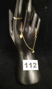 1 Bracelet (L18,5cm) et 1 bague motif coeur (TD54). Le tout en or 750/1000 18k. PB 4,9g