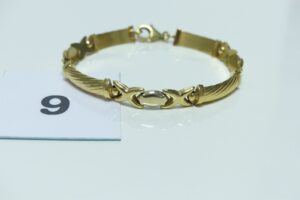 1 bracelet maille articulée en or 750/1000 et à décor de petites croix et de motifs striés (L18cm). PB 11g