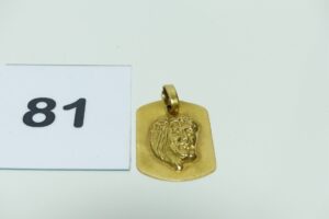 1 pendentif en or à décor du Christ (H2,5cm). PB 4,1g