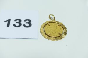 1 pendentif en or 750/1000, serti-griffes 1 pièce de 10frs NapIII 1867B. PB 5,9g