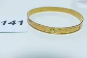1 bracelet rigide ouvragé en or 750/1000 (diamètre 6,5cm). PB 15,2g