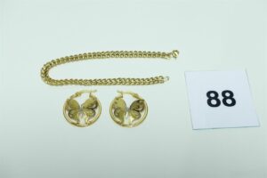 1 bracelet maille tressée (L19cm) et 2 boucles à décor d'un papillon bicolore. le tout en or 750/1000. PB 6,1g