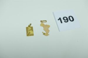 1 pendentif signe du lion en or 750/1000. PB 2,4g et 1 pendentif ouvragé en or 585/1000. PB 1,3g