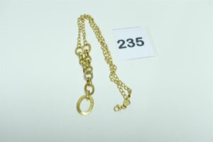 1 collier en or 750/1000 motif central à décor de cercles (L40cm). PB 8,6g