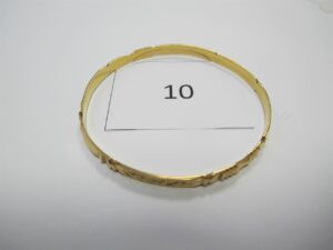 1 Bracelet en or 18k(750/1000)ciselé (D7cm).PB17,14g.