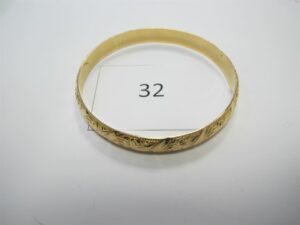1 Bracelet en or 18k(750/1000)ouvragé (D7cm).PB 21,80g.