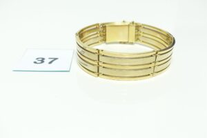 1 Bracelet maille articulée (L 26cm) en or bicolore 750/1000. PB 159,2g
