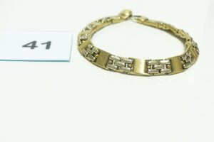 1 Bracelet maille articulée en damier (L 24cm) en or bicolore 750/1000. PB 47,8g