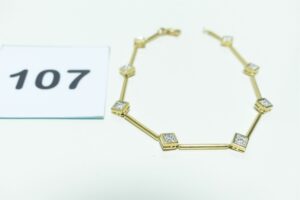 1 Bracelet maille articulée orné de petits diamants (L 19cm) en or 750/1000. PB 7,7g