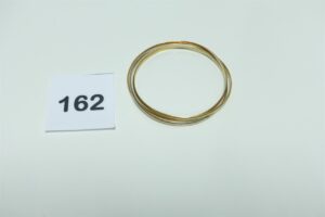 1 bracelet jonc bicolore à 3 brins en or 750/1000 (diamètre 6,5cm). PB 25,2g