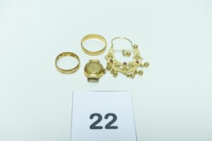 1 boucle savoyarde ornée de petites pierres rouges, 1 boîtier de montre de marque LIP (6grs) et 2 alliances (Td53/58). Le tout en or 750/1000. PB 18,9g